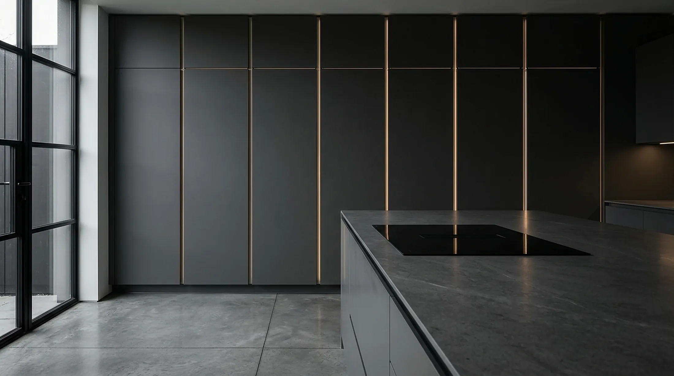 Graphite handleless kitchen with stone island and lit pull channels